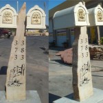 Double Mailbox post made from natural stone in concrete base